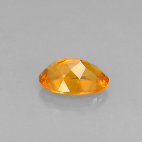 Clinohumita laranja natural 0,52ct, corte oval, VS