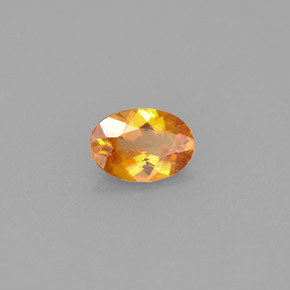 Clinohumita laranja natural 0,42ct, corte oval, VS