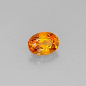 Clinohumita laranja natural 0,44ct, corte oval, VS