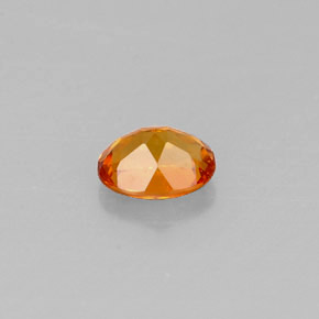 Clinohumita laranja natural 0,44ct, corte oval, VS