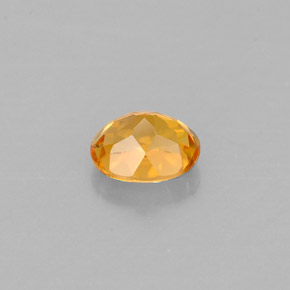 Clinohumita amarelo natural 0,56ct, corte oval, VVS-VS