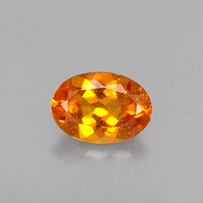 Clinohumita laranja natural 0,46ct, corte oval, VS-SI