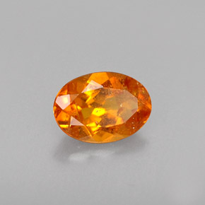 Clinohumita laranja natural 0,46ct, corte oval, VS-SI