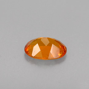 Clinohumita laranja natural 0,46ct, corte oval, VS-SI