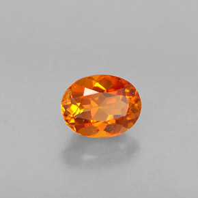 Clinohumita laranja natural 0,36ct, corte oval, VS