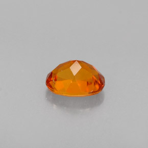 Clinohumita laranja natural 0,36ct, corte oval, VS