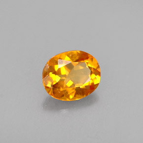 Clinohumita laranja natural 0,41ct, corte oval, VS