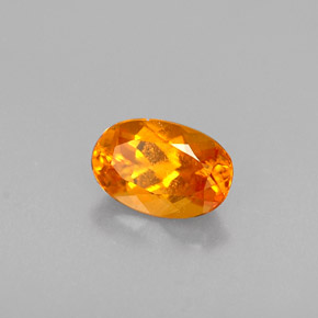 Clinohumita laranja natural 0,47ct, corte oval, VS-SI