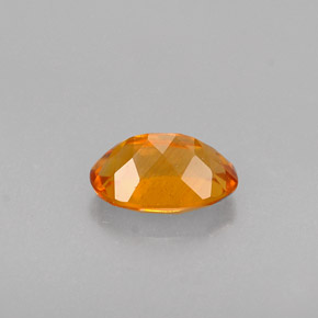 Clinohumita laranja natural 0,47ct, corte oval, VS-SI