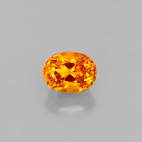 Clinohumita amarelo alaranjado natural 0,36ct, corte oval, VS-SI