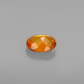 Clinohumita laranja natural 0,54ct, corte oval, VS