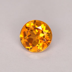 Clinohumita Amarelo alaranjado Natural 0.71ct, Corte Redondo, VS