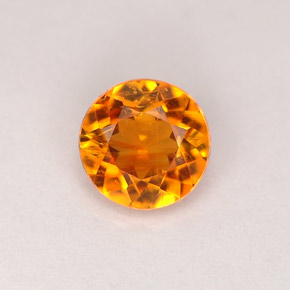 Clinohumita amarelo alaranjado natural 0,68ct, corte redondo, VS-SI