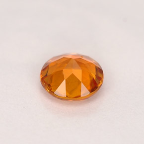 Clinohumita amarelo alaranjado natural 0,68ct, corte redondo, VS-SI