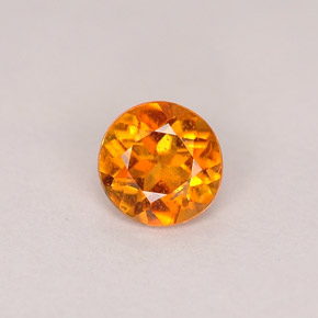 Clinohumita laranja natural 0,46ct, corte redondo, SI