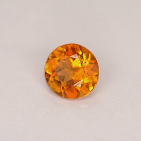 Clinohumita laranja natural 0,46ct, corte redondo, SI
