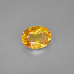 Clinohumita laranja natural 1,68ct, corte oval, VS-SI