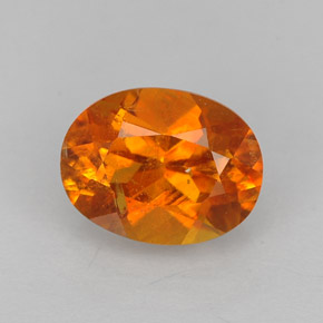 Clinohumita laranja natural 1,43ct, corte oval, VS-SI