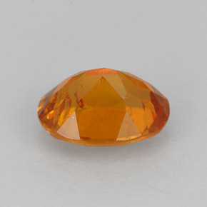 Clinohumita laranja natural 1,43ct, corte oval, VS-SI