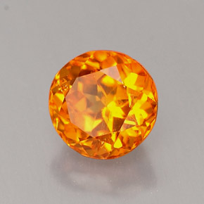 Clinohumita Amarelo alaranjado Natural 0.89ct, Corte Redondo, VS-SI