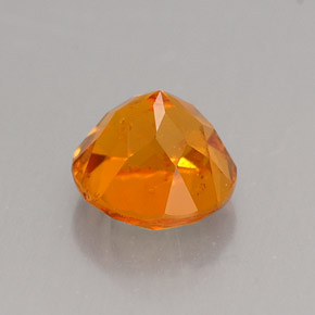 Clinohumita Amarelo alaranjado Natural 0.89ct, Corte Redondo, VS-SI