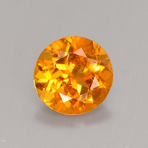 Clinohumita laranja natural 0,62ct, corte redondo, VS-SI