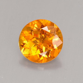 Clinohumita laranja natural 0,62ct, corte redondo, VS-SI