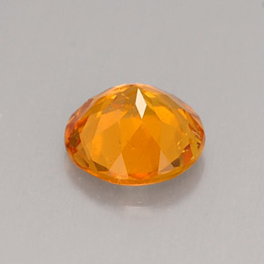 Clinohumita laranja natural 0,62ct, corte redondo, VS-SI