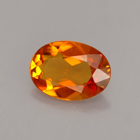 Clinohumita laranja natural 1,23ct, corte oval, VS