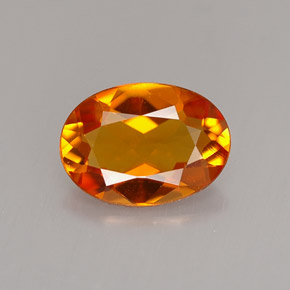 Clinohumita laranja natural 1,23ct, corte oval, VS