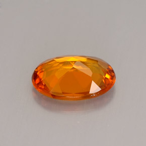 Clinohumita laranja natural 1,23ct, corte oval, VS