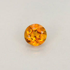 Clinohumita amarelo alaranjado natural 0,52ct, corte redondo, VS
