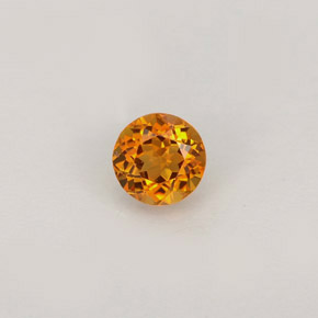 Clinohumita amarelo alaranjado natural 0,46ct, corte redondo, VS