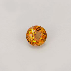 Clinohumita amarelo alaranjado natural 0,46ct, corte redondo, VS