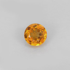 Clinohumita laranja natural 0,59ct, corte redondo, VS-SI