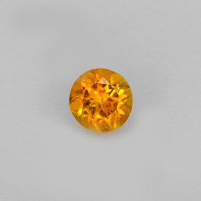 Clinohumita laranja natural 0,60ct, corte redondo, VS-SI