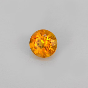 Clinohumita laranja natural 0,60ct, corte redondo, VS-SI