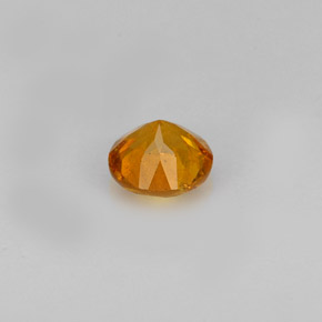 Clinohumita laranja natural 0,60ct, corte redondo, VS-SI