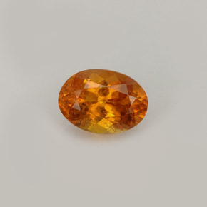 Clinohumita laranja natural 0,93ct, corte oval, VS-SI