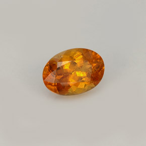 Clinohumita laranja natural 0,93ct, corte oval, VS-SI
