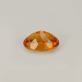 Clinohumita laranja natural 0,93ct, corte oval, VS-SI