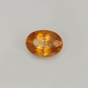 Clinohumita Amarelo alaranjado Natural 0.77ct, Corte Oval, VS
