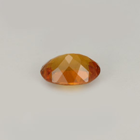 Clinohumita Amarelo alaranjado Natural 0.77ct, Corte Oval, VS