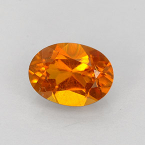 Clinohumita laranja natural 0,84ct, corte oval, VS-SI