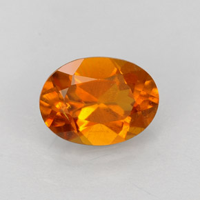 Clinohumita laranja natural 0,84ct, corte oval, VS-SI