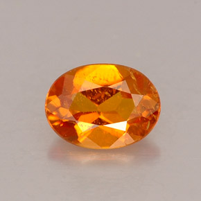 Clinohumita laranja natural 0,53ct, corte oval, VS