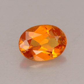 Clinohumita laranja natural 0,53ct, corte oval, VS