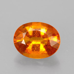 Clinohumita laranja natural 1,46ct, corte oval, VS-SI