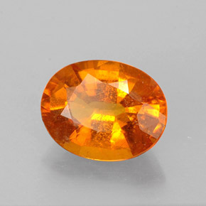 Clinohumita laranja natural 1,46ct, corte oval, VS-SI