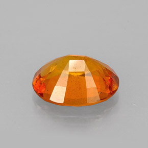 Clinohumita laranja natural 1,46ct, corte oval, VS-SI